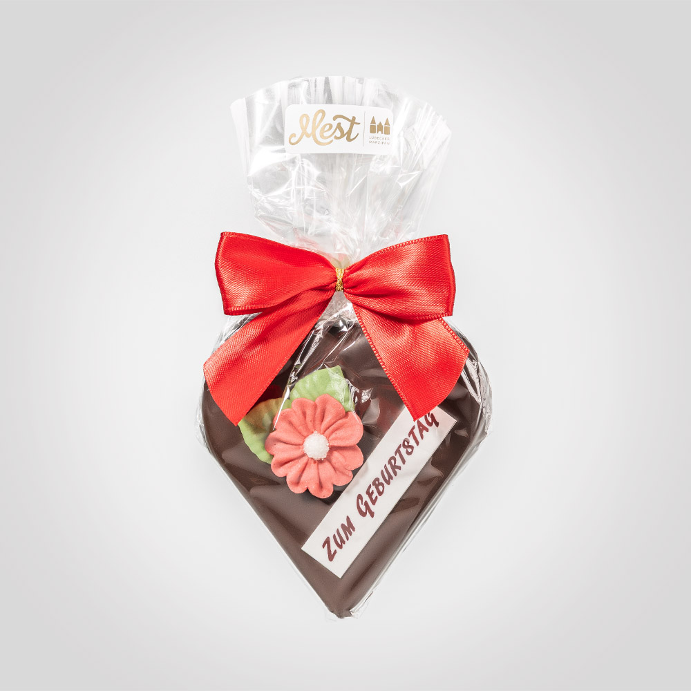 Lübecker Marzipan-Herz "Geburtstag" g.g.A. in Zartbitterschokolade Lübecker Marzipan-Herz "Geburtstag" g.g.A. in Zartbitterschokolade