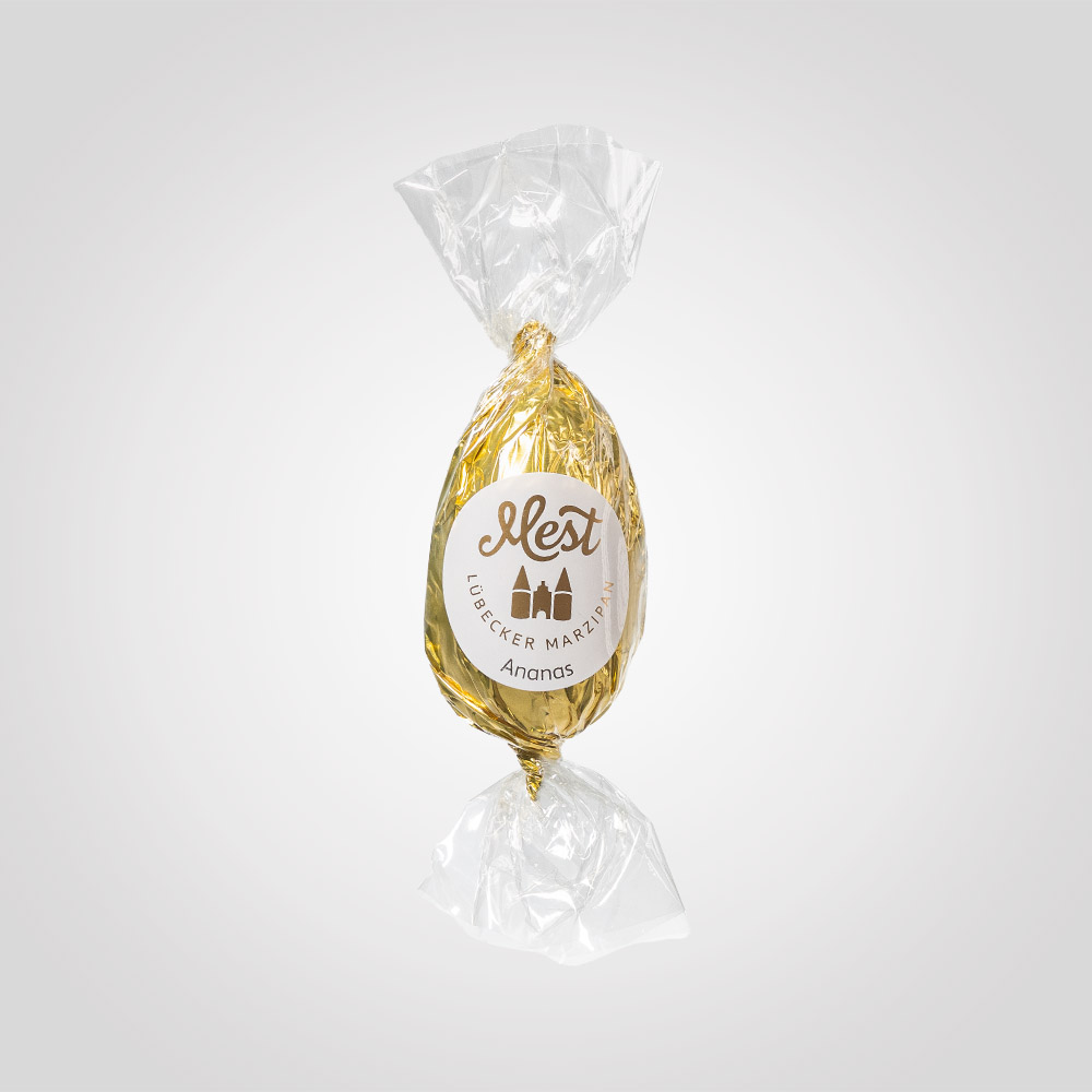 Lübecker Marzipan-Ei mit Ananas g.g.A. in Zartbitterschokolade